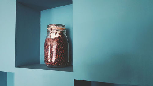 Close-up of glass jar on table at home