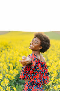 Woman standing on field