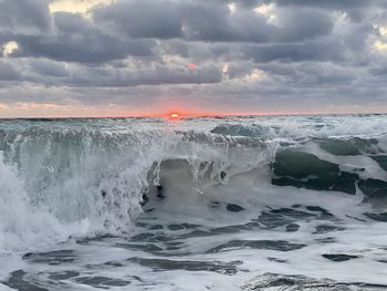 Scenic view of sea against sky during sunset