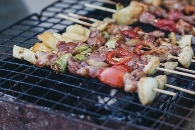 Close-up of meat on barbecue grill