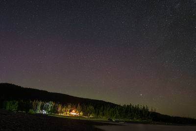 Scenic view of star field against sky at night