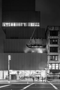 Illuminated buildings in city at night