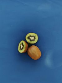 Directly above shot of fruits on blue background