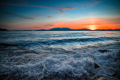 Scenic view of sea against sky during sunset