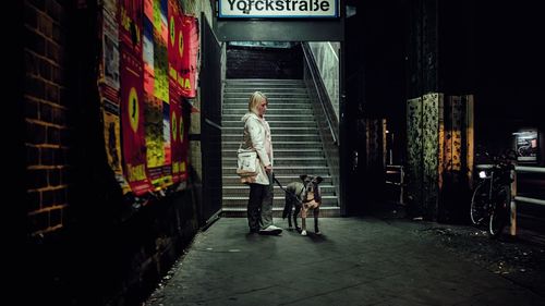 Full length of woman standing in city