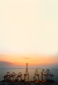 Scenic view of sea against clear sky during sunset