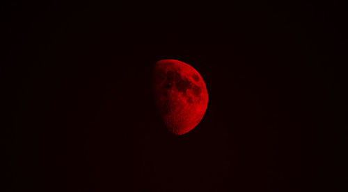 Low angle view of moon against sky at night