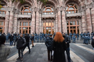 Group of people in front of building