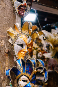 Close-up of mask for sale at street market