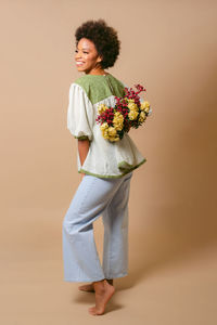 Young woman holding bouquet