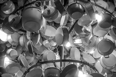 Low angle view of illuminated lights hanging from ceiling