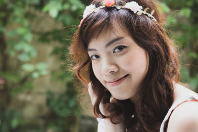 Close-up portrait of woman smiling