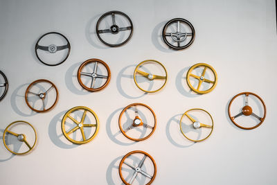 Full frame shot of clock on table against white background