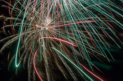 Low angle view of light trails at night