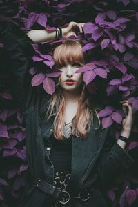 Portrait of woman with pink flowers