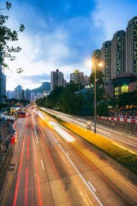 High angle view of light trails on road at night