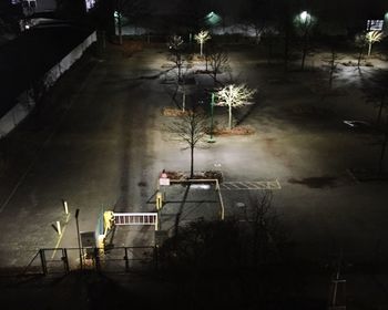 Illuminated street lights at night
