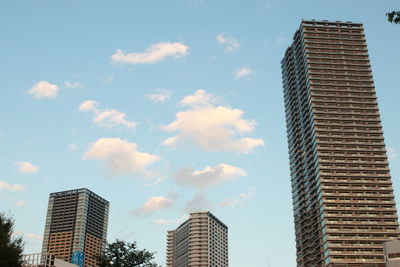 Low angle view of skyscrapers against sky