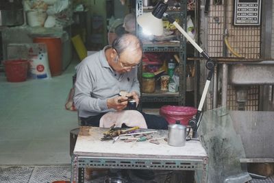 Man working on table