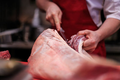 Close-up of man preparing food