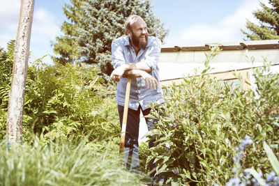 Young man working garden