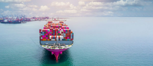 Ship in sea against sky