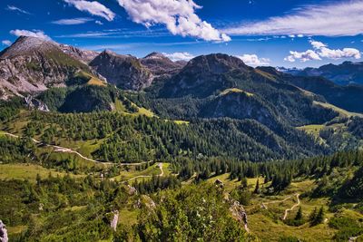 Scenic view of landscape and mountains against sky