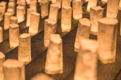 Handmade japanese paper washi lanterns illuminating the stone steps of the zojoji temple.