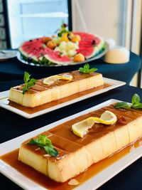 High angle view of fruits in plate on table