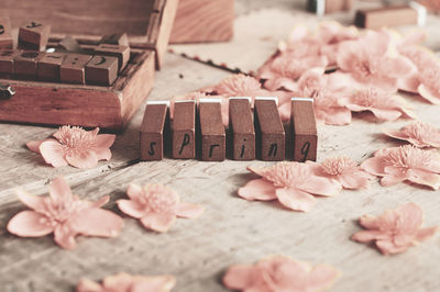 Close-up of pink roses on table