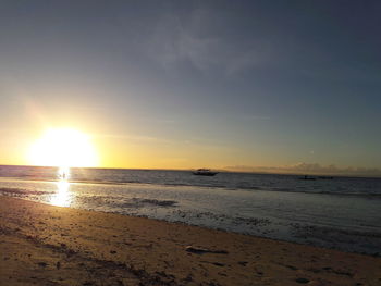 Scenic view of sea at sunset