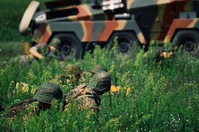 Low angle view of soldier in field