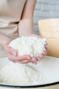 Midsection of woman holding food