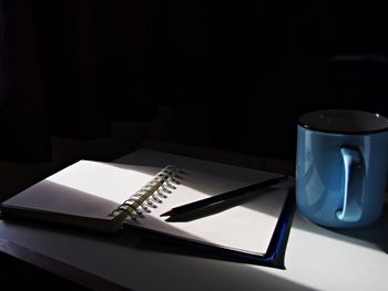 High angle view of coffee cup on table