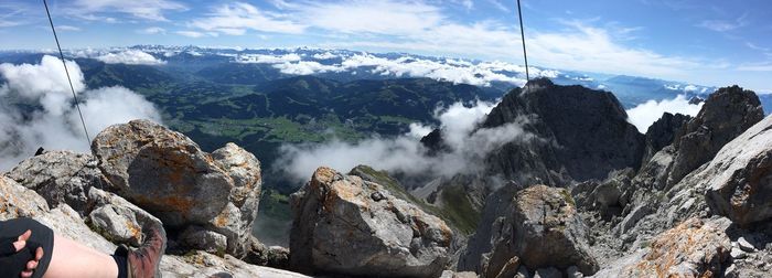 Panoramic view of waterfall against sky