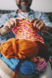 Midsection of woman with scarf