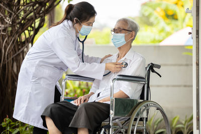 Doctor examining patient at hospital