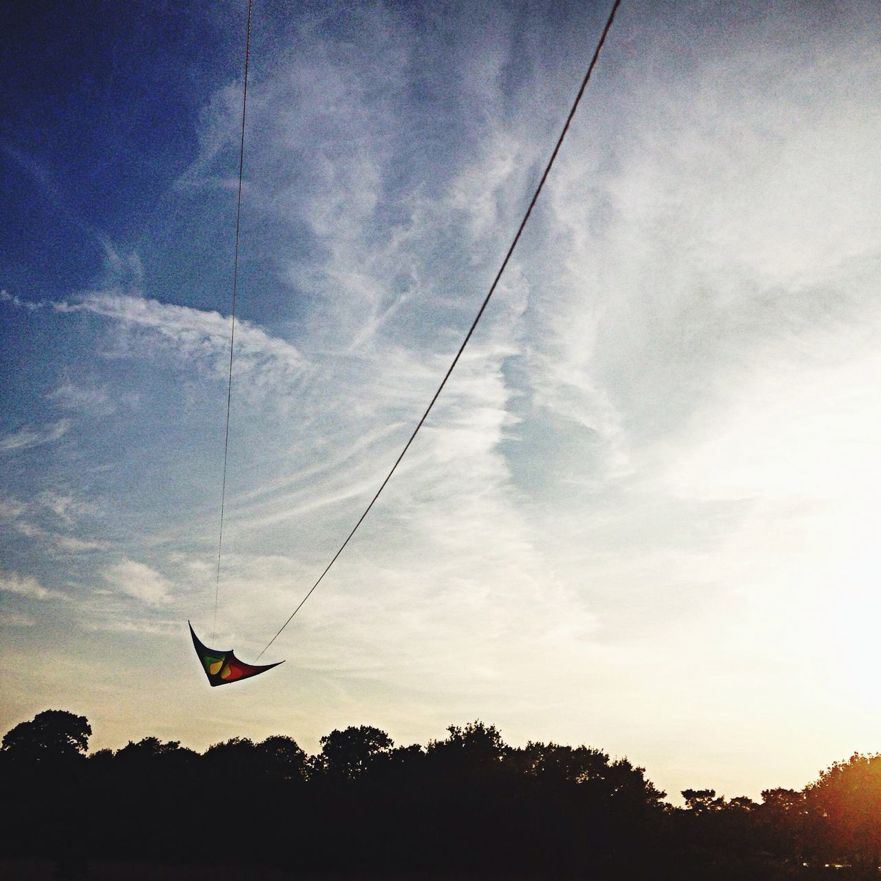 transportation, mode of transport, sky, flying, tree, low angle view, mid-air, airplane, cloud - sky, air vehicle, silhouette, travel, on the move, journey, nature, tranquility, adventure, outdoors, day, cloud