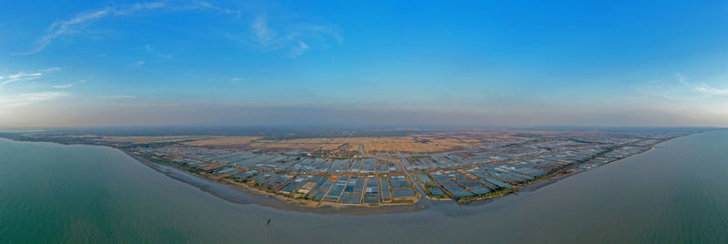 High angle view of city against cloudy sky