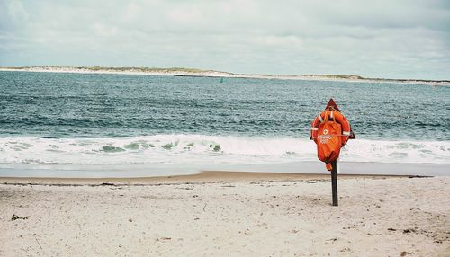 Woman standing on beach