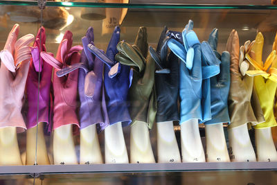 Various clothes hanging in store for sale