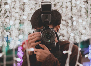 Portrait of man photographing