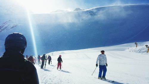 Group of people snowboarding