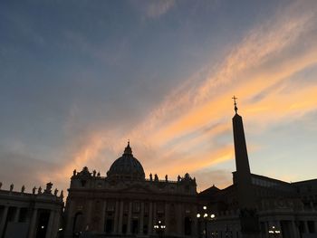 Church against sky at sunset