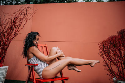 Woman sitting on seat
