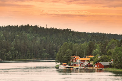 Scenic view of lake against sky during sunset