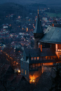 High angle view of illuminated buildings at night