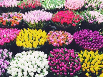 High angle view of flower bouquets for sale at market stall