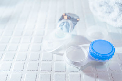 High angle view of drinking glasses on table
