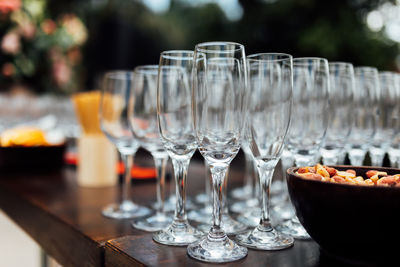 Luxury table settings for fine dining with and glassware, pouring wine to glass.beautiful background